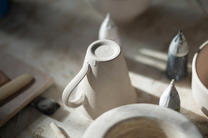 Close-up of ceramic mug on worktop