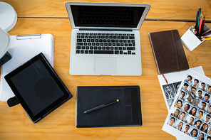 Top view of laptop, graphic tablet and digital tablet on desk