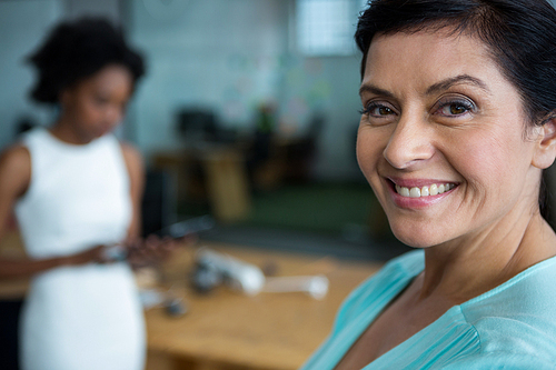 Portrait of beautiful female graphic designer smiling