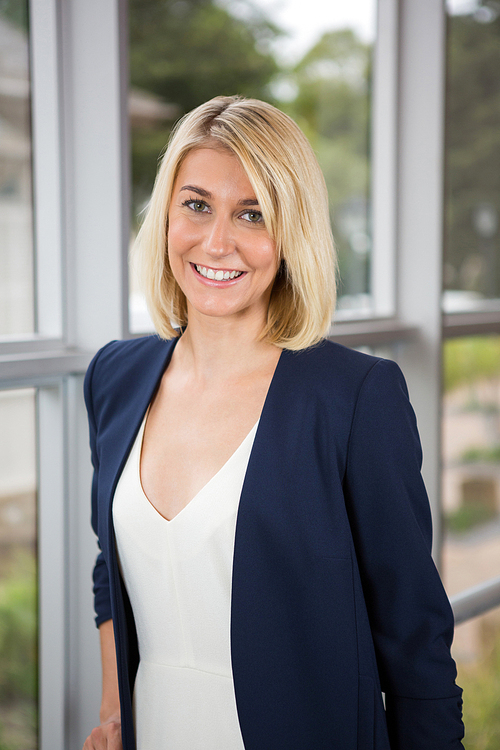 Portrait of a beautiful businesswoman standing in conference centre