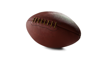 Close-up of brown American  football against white background