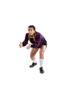 Female rugby player in catching position against white background