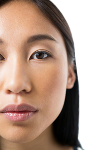 Close-up of womans face against white background