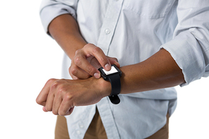Mid section of man using smartwatch against white background