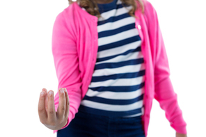 Girl pretending to be holding invisible object against white background