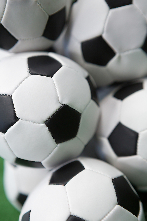 Close-up of stacked football soccer balls