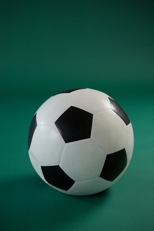 Close-up of football on green background