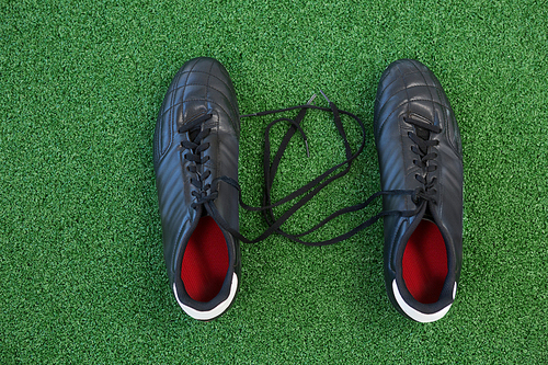 Overhead of cleats on artificial grass