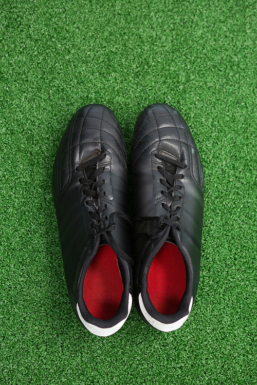 Overhead of cleats on artificial grass