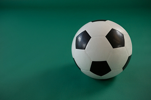 Close-up of football on green background