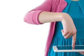 Mid section of girl using digital tablet against white background