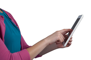 Mid section of girl using digital tablet against white background