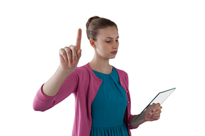 Teenage girl using a glass digital tablet against white background