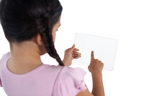 Girl using a glass digital tablet against white background