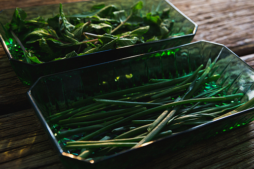 Close-up of chives and herbs in a bowl