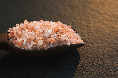 Close-up of himalayan salt in a scoop