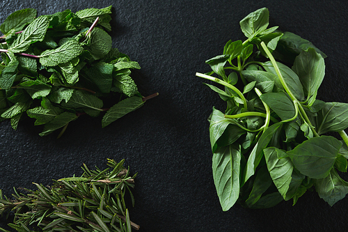 Various type of herbs on black background