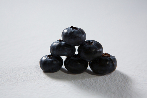 Close-up of blueberries on a white background