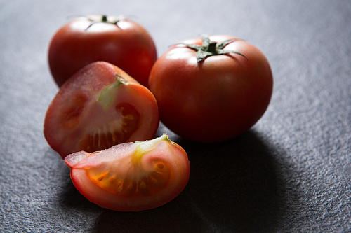 Close-up of tomatoes on black background