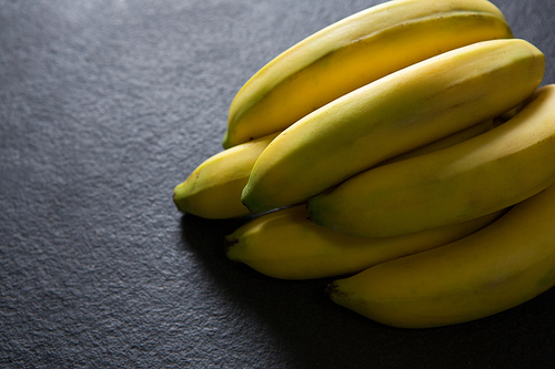 Close-up of fresh organic banana on black background