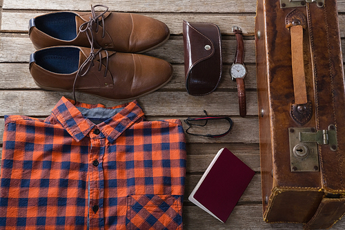 Overhead of various accessories on wooden table