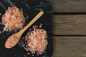 Close-up of himalayan salt on board