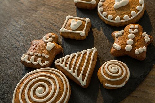 Close up of gingerbread cookies on slate at table