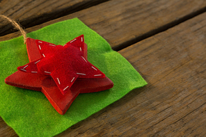 High angle view of star shape decoration of fabric at table