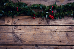 Overhead of christmas decoration on wooden plank