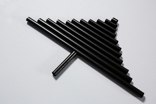 Close-up of black pipes arranged in christmas tree shape