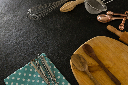 Close-up of various cookie utensils on table