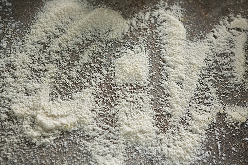 Close-up of flour on table