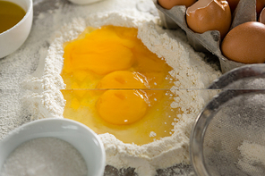 Close-up of egg yolk mixed with flour