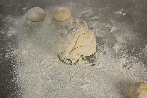 Close-up of dough and flour