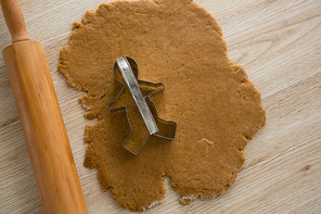 Over head view of cookie cutter placed over flattened dough