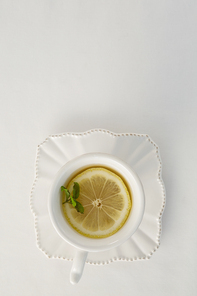 Overhead view of lemon tea in a cup