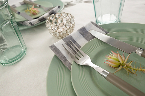 close-up of overhead view of elegant table setting