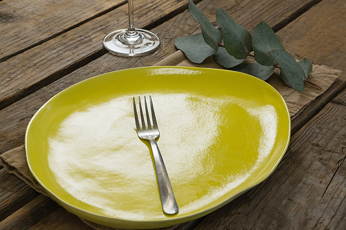 Close-up of elegant table setting with leaf