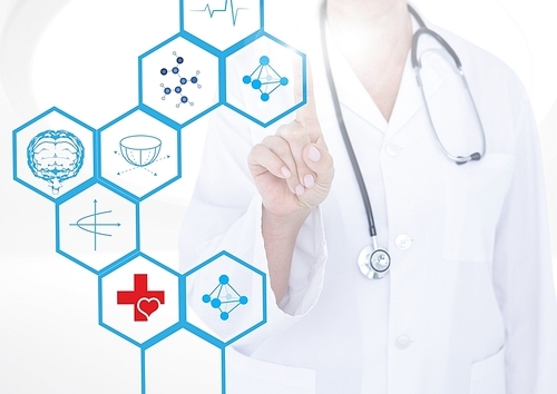 Mid section of doctor touching digitally generated medical icons against white background