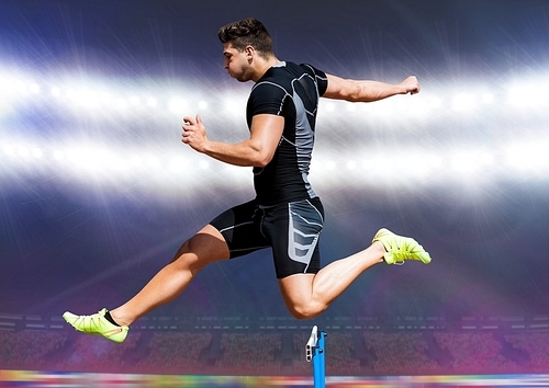 Athlete running over hurdle against digitally composite stadium