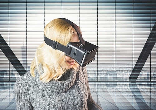Smiling woman using virtual really headset against digitally composite background