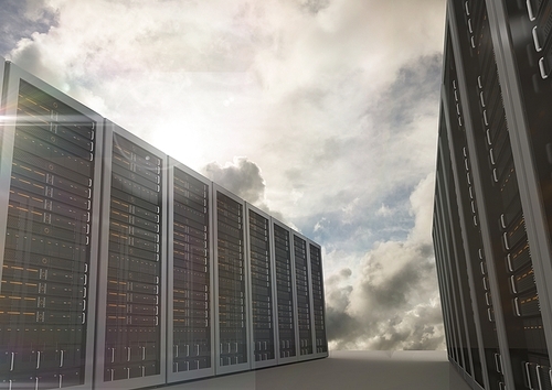 Digital composite of server room arranged in rows against dusky clouds