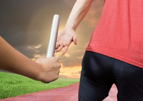 Digitally composite of athlete passing the baton to teammate in stadium at sunset