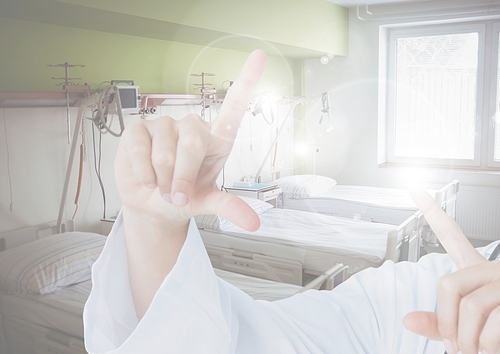 Hand of doctor using digital screen in hospital