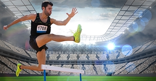 Digital composite image of male athlete jumping above the hurdle in stadium