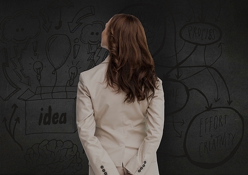 Confused businesswoman looking at start up icons against digitally generated background
