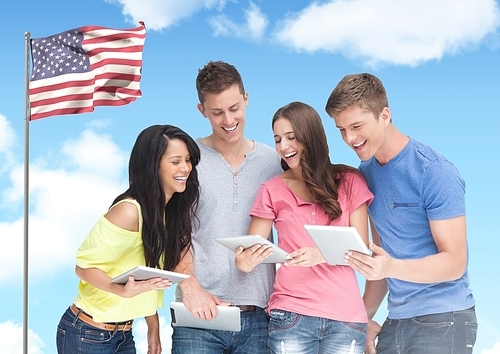 Digital composition of friends using digital tablet against american flag in background