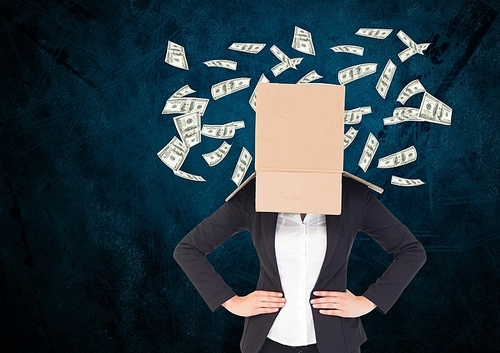 Digital compositon of businesswoman with her face cover with cardboard box standing against dollars flying in background
