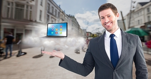 Digital generated image of businessman standng posture hand with laptop and cloud