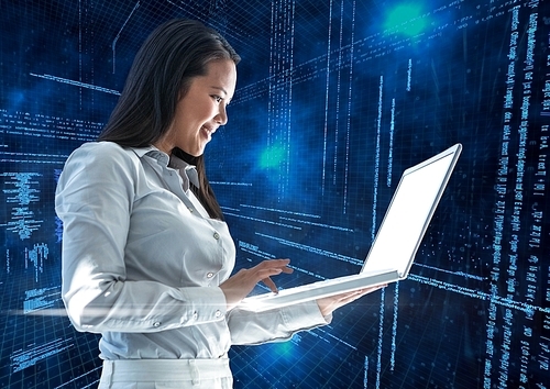 Digital composition of businesswoman using laptop with binary codes in blue background